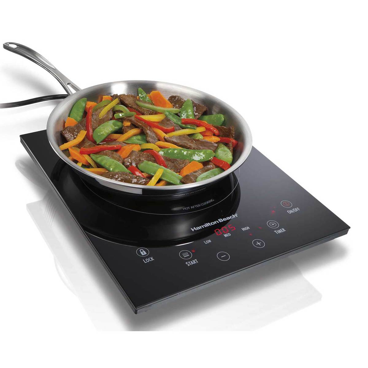 Hamilton Beach 34102 black portable induction cooktop with one cooking zone, touch controls and a pan.