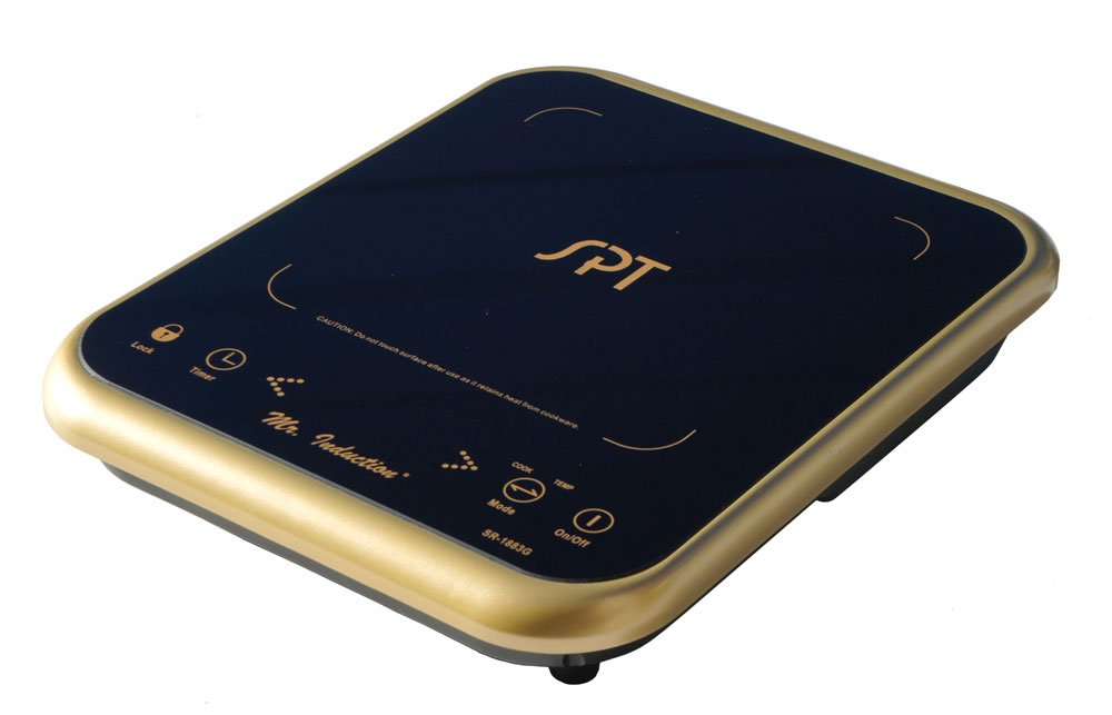 SPT SR-1883G one-zone induction cooktop with black glass surface, gold-colored trim and touch controls, shown from above at an angle