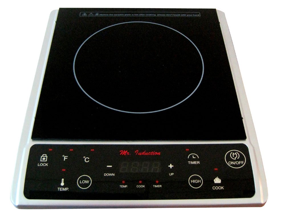 SPT SR-964TS one-zone induction cooktop with black glass surface, one marked ring, silver-colored trim and front control strip, viewed at an angle
